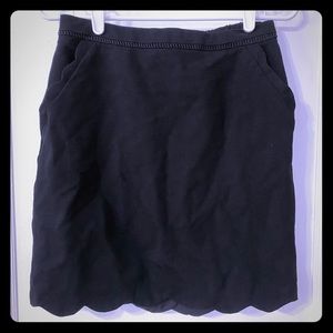 Black scallop skirt with pockets